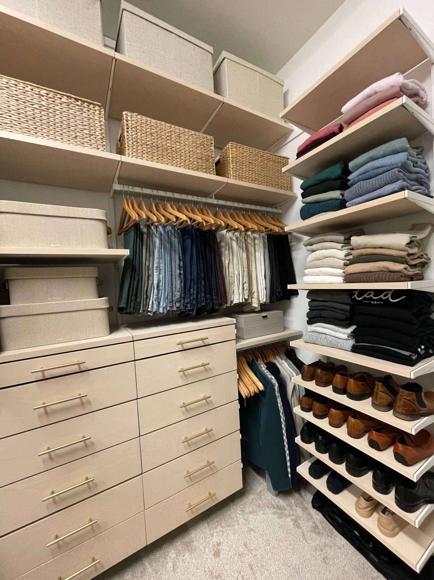 Custom closet system organized by category with matching hangers