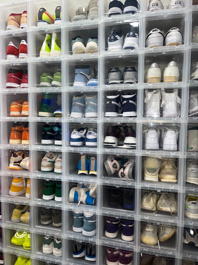 Shoes stored on vertical shelving in a small original Lakewood closet